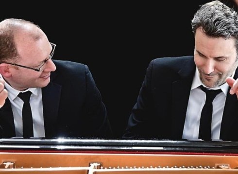 DUELING PIANOS WITH FLYING IVORIES